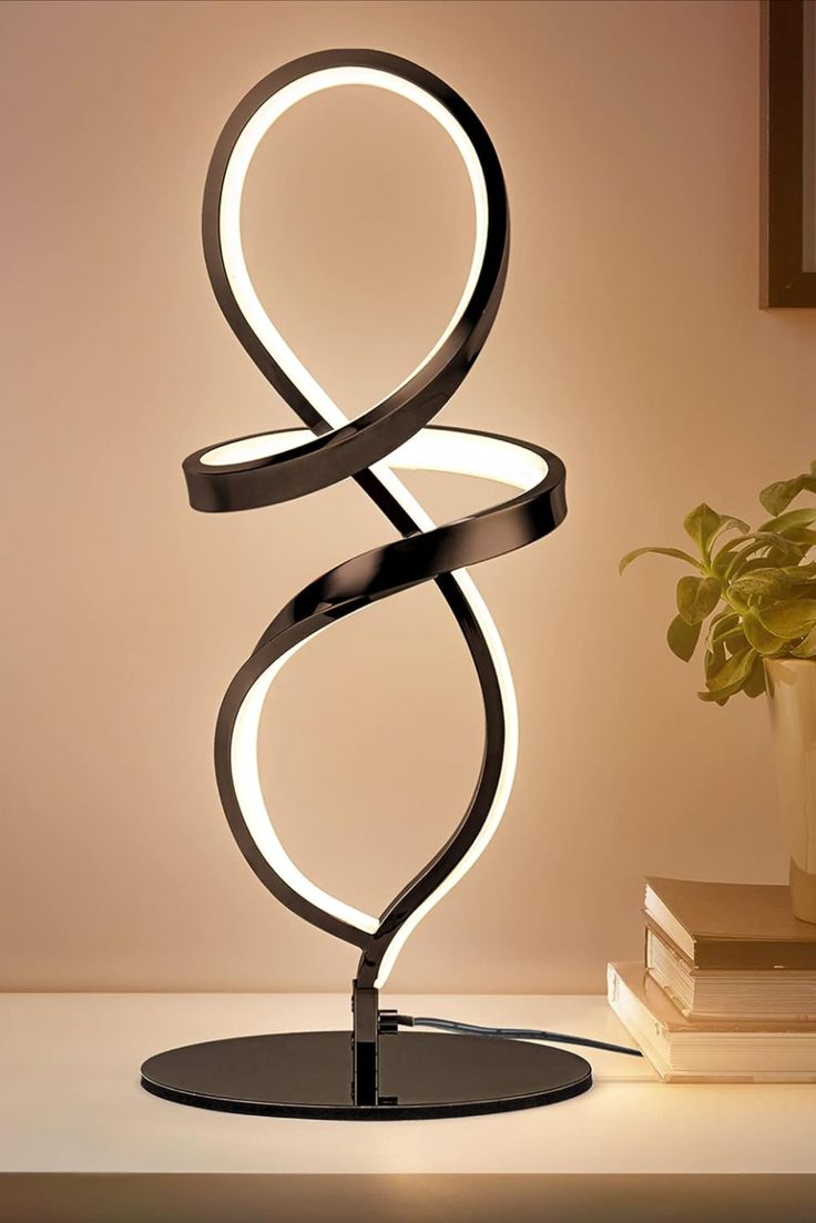 Modern Spiral Lamp sleek black design with soft glowing loops